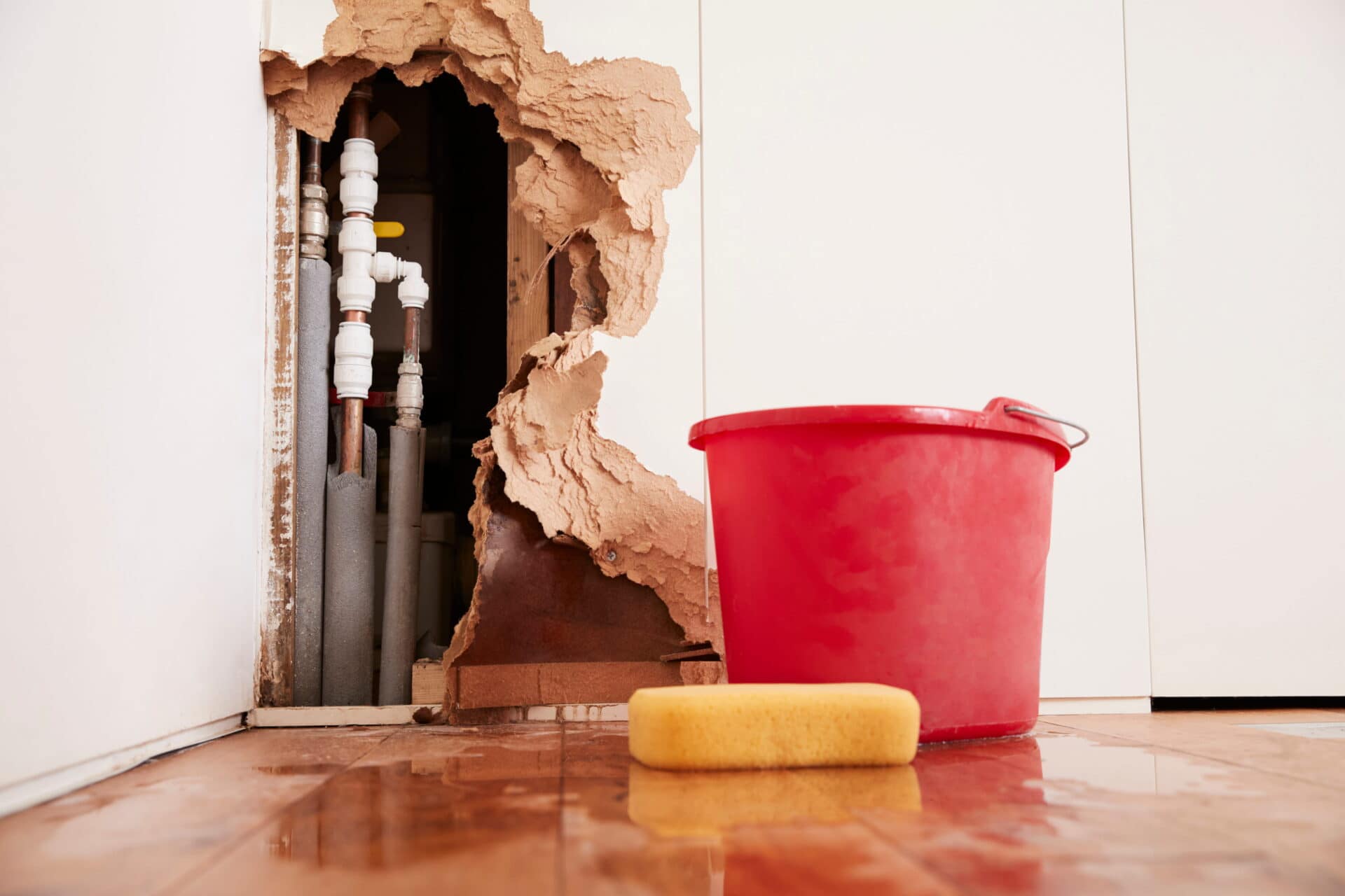 managing home water damage caused by burst pipes